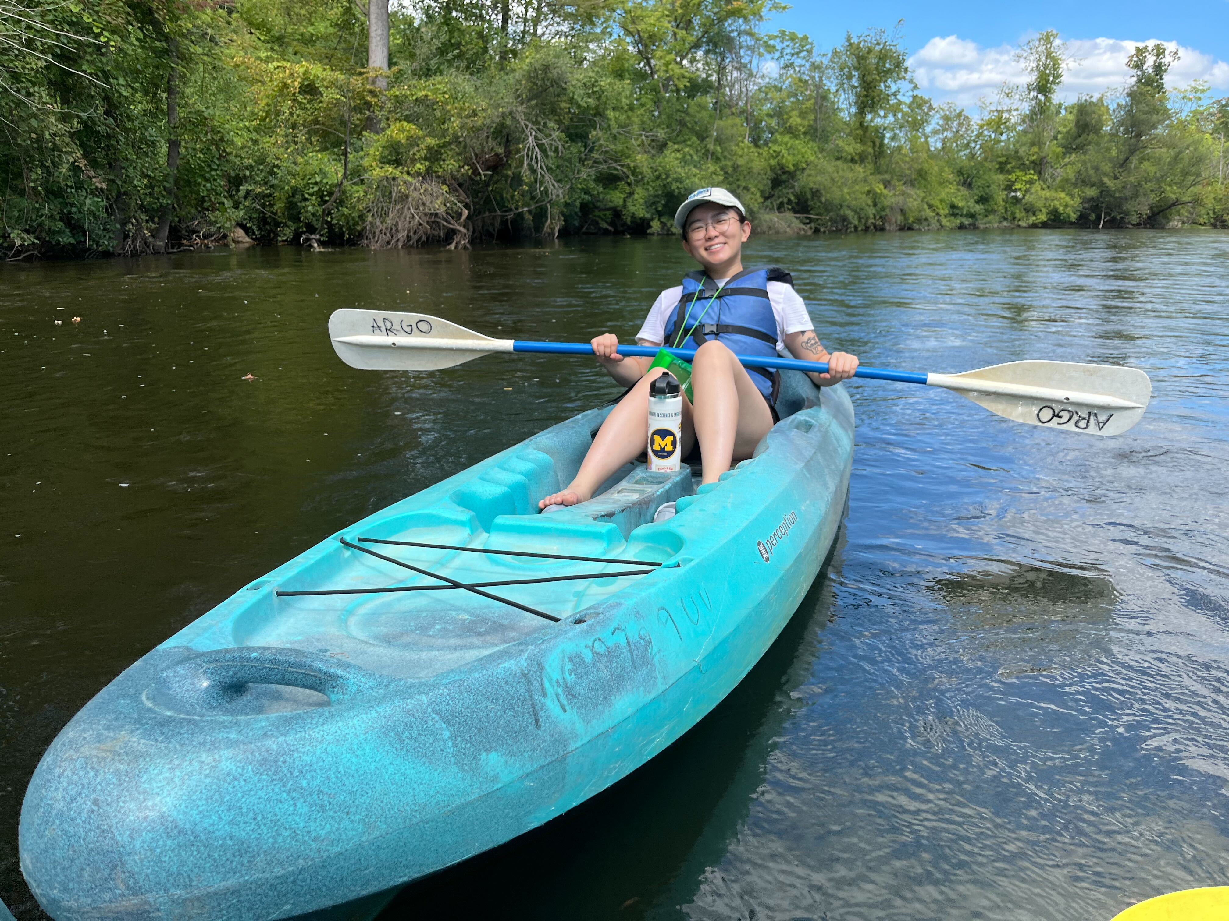 photo of Xinyun on a kayak in the water